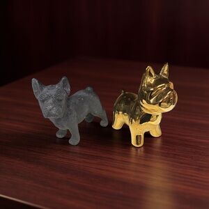 Gold and Black Dog Figurines